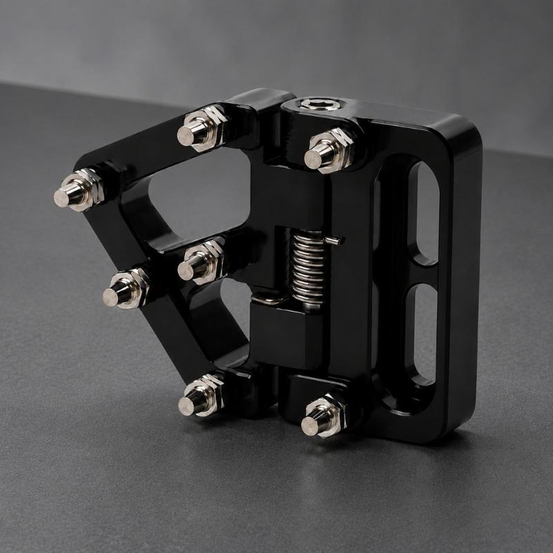 Metal-Pin Motorcycle Brake Toe Tip with Pivoting Spring Hinge, Aluminum Body, and an Elongated Slotted Attachment Section