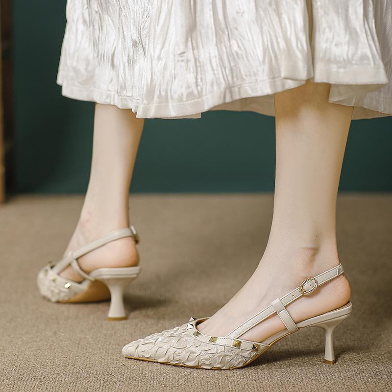 Baotou sandals women's 2025 new rivets one-word buckle belt fairy wind back empty single shoes pointed high heels stiletto