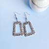 Retro Hollow Trapezoid Earrings with Irregular Polka Dot Pattern