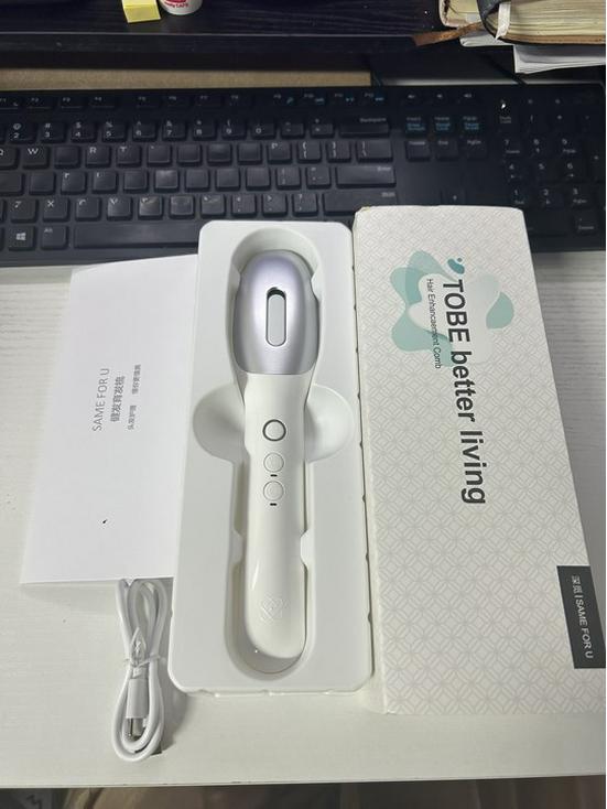 

Электрическая расческа-массажер для кожи головы с терапией красным и синим светом Without Hair Growth Liquid белый