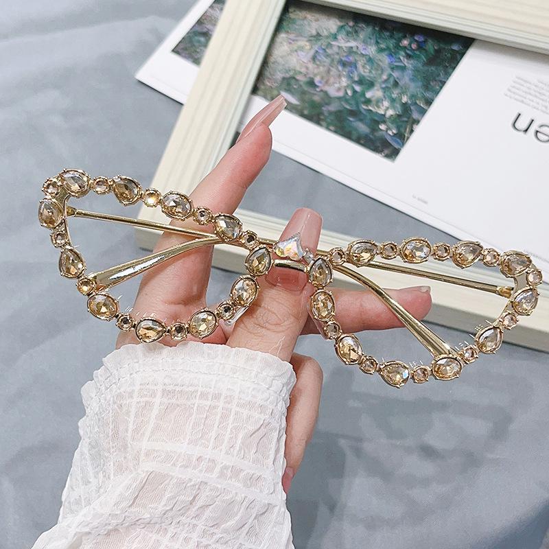 

Солнцезащитные очки «кошачий глаз» геометрической формы с треугольными стразами Regular