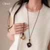 Autumn and winter retro irregular hollow resin pendant necklace light luxury high-end sweater chain fashion versatile necklace women