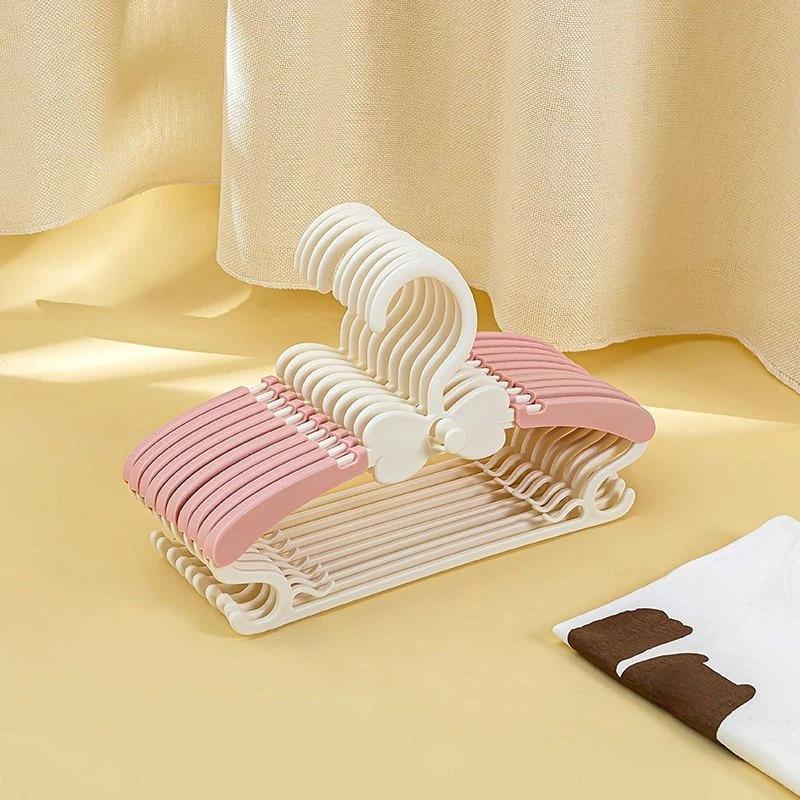 Выдвижная вешалка для детской одежды Многофункциональный инструмент для хранения в шкафу Без следов Домашнее использование Сушилка Стойка для детских брюк и платьев 10 Pieces total розовый 5070₽