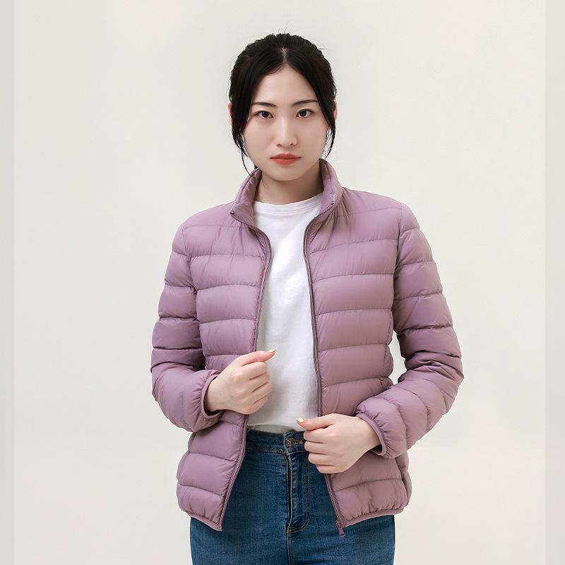 Autumn and winter new women's light stand-up collar hooded down jacket white duck down women's slim fit large size light jacket