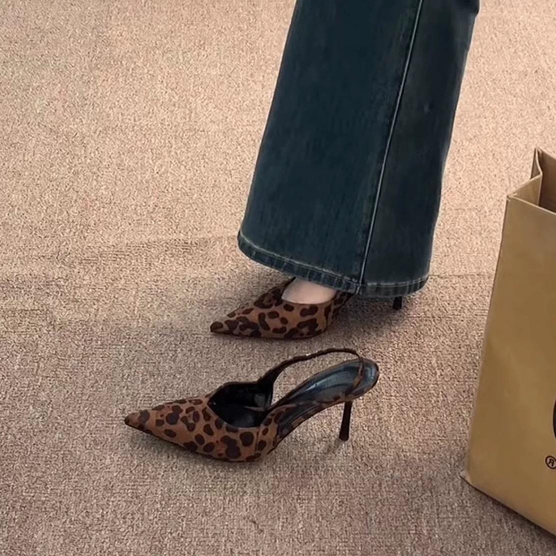 

Leopard print pointed high heels women s 2025 new summer outer wear temperament advanced not tired feet word with bag head sandals 40