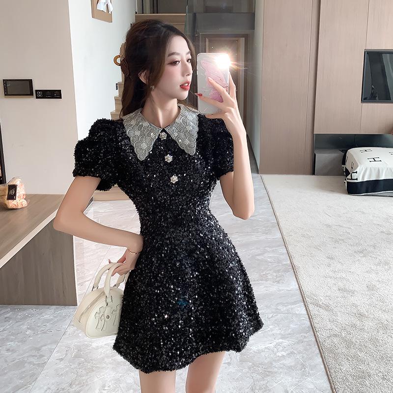 

Женское платье А-силуэта с пуговицами из стразов и ярким шелковым лацканом Extra Large чёрный