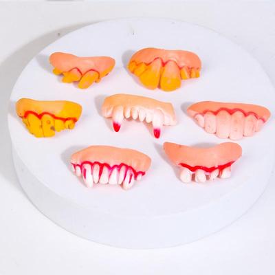 Vampir- und Zombie-Halloween-Streichzähne - Gag-Requisiten für Aprilscherz und Maskeraden