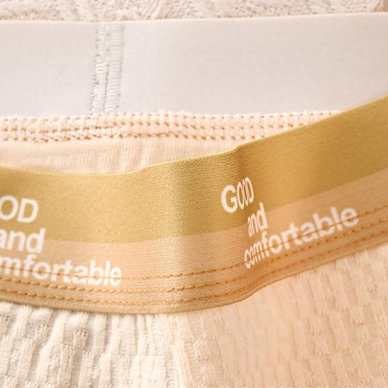 Herren-Boxershorts, mittelhoher Bund, elastischer Bund, Buchstabendruck, U-konvexe Shorts, atmungsaktiv, glatte Linien