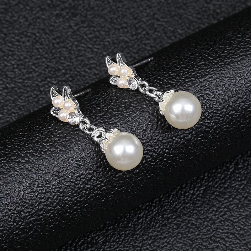 European and American pearl necklace earrings set women's fashion temperament explosive alloy water drop flower bridal dress personality