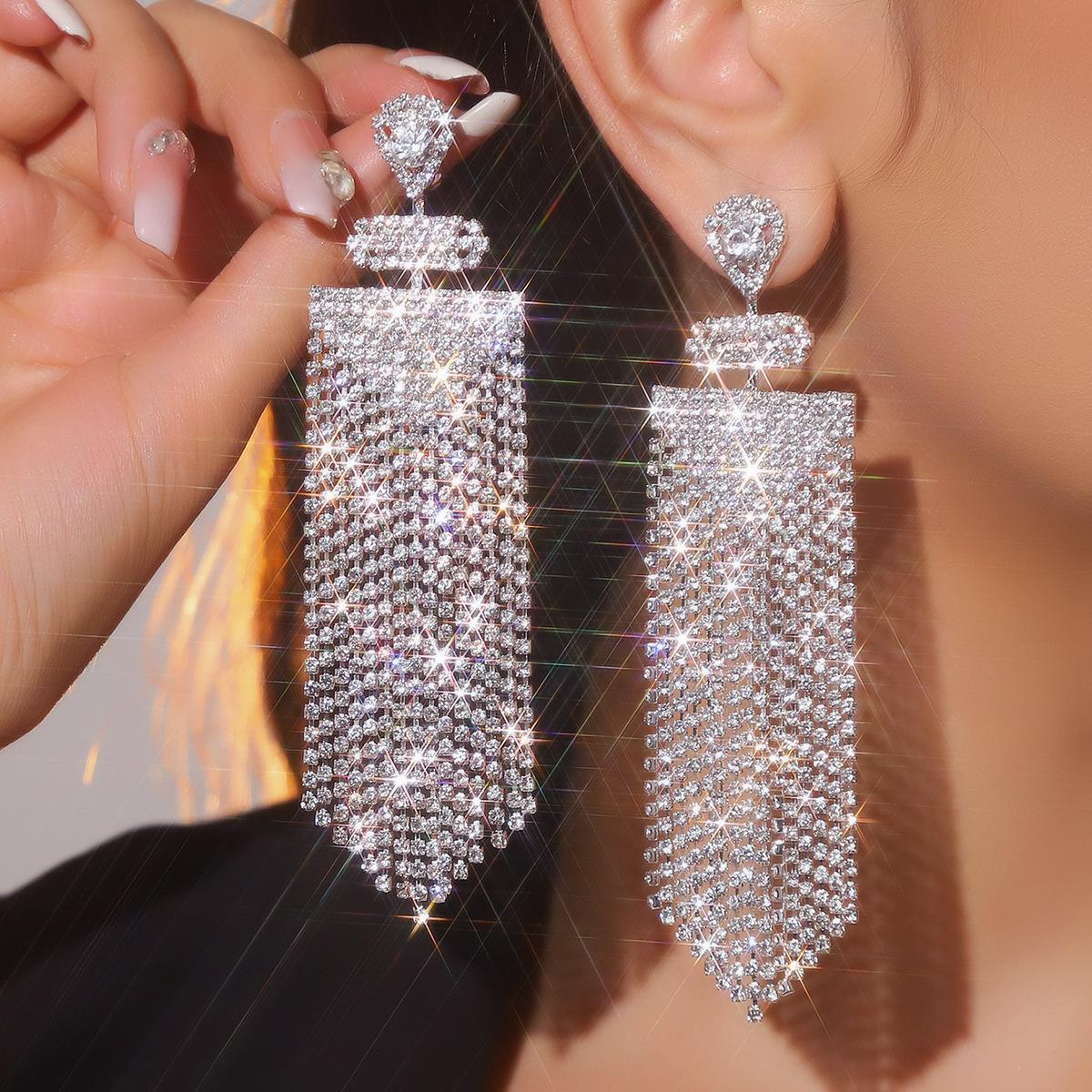 

Heavy industry high-end shiny rhinestone sword earrings