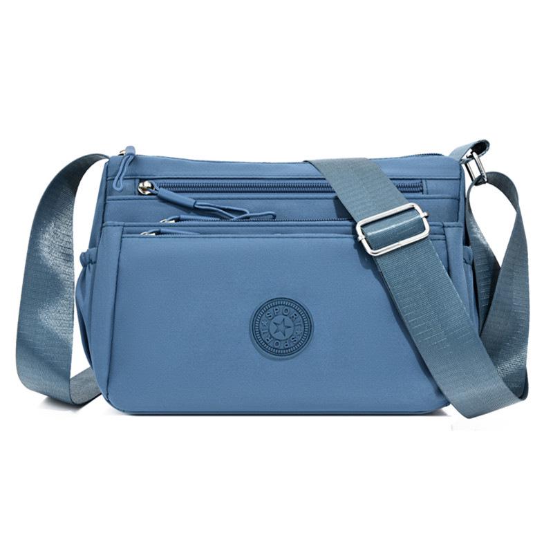 

Женская сумка через плечо из ткани Оксфорд с множеством карманов 2026: Стильная, многослойная и простая сумка через плечо для повседневных поездок синий