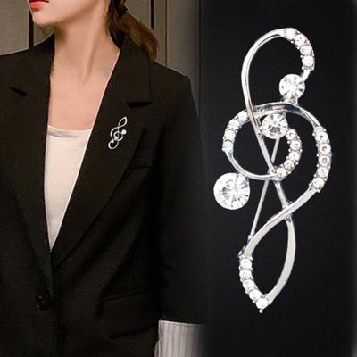 Broche de mujer unisex con forma de escamas y brillantes diamantes de imitación