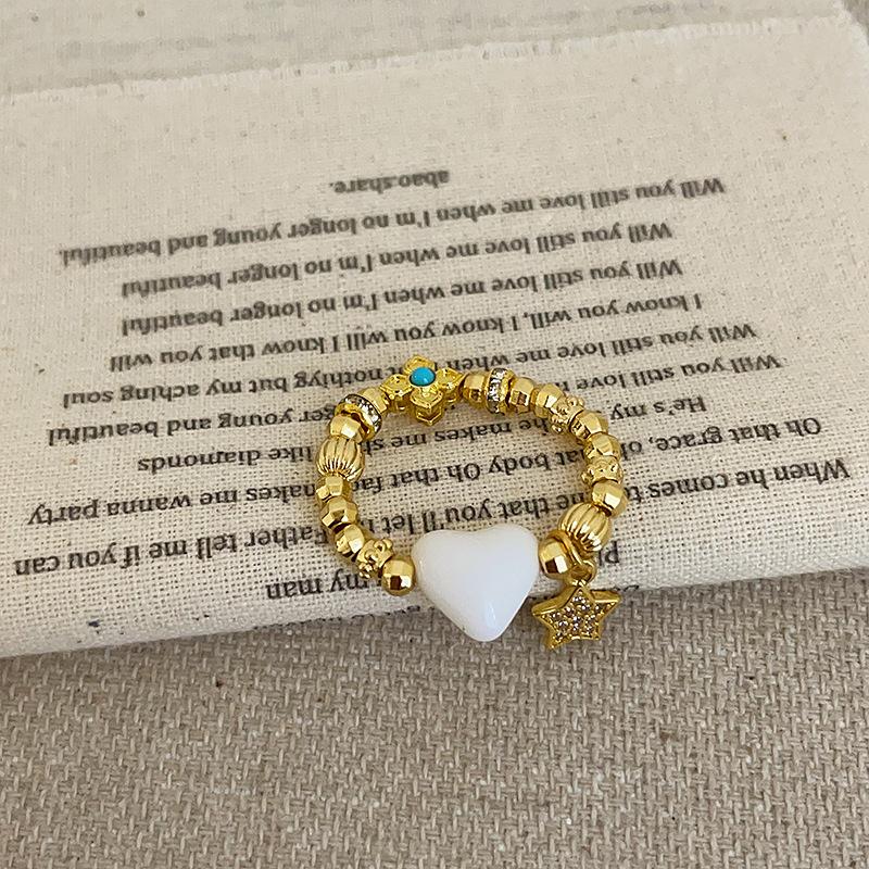 

Двустороннее кольцо Love Star Flower с бусинами и эластичной веревкой, женское нишевое дизайнерское кольцо Sense Retro, универсальное кольцо