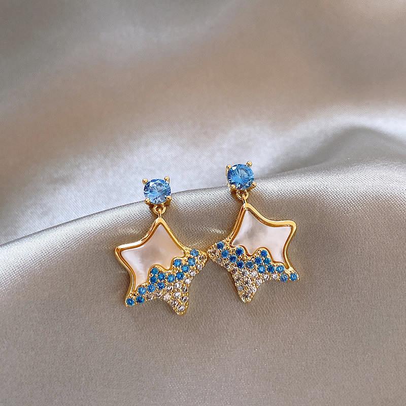 

Silver needle with diamonds, resin star stud earrings, female Korean version ins fashion earrings, versatile commuter earrings, niche high-end sense