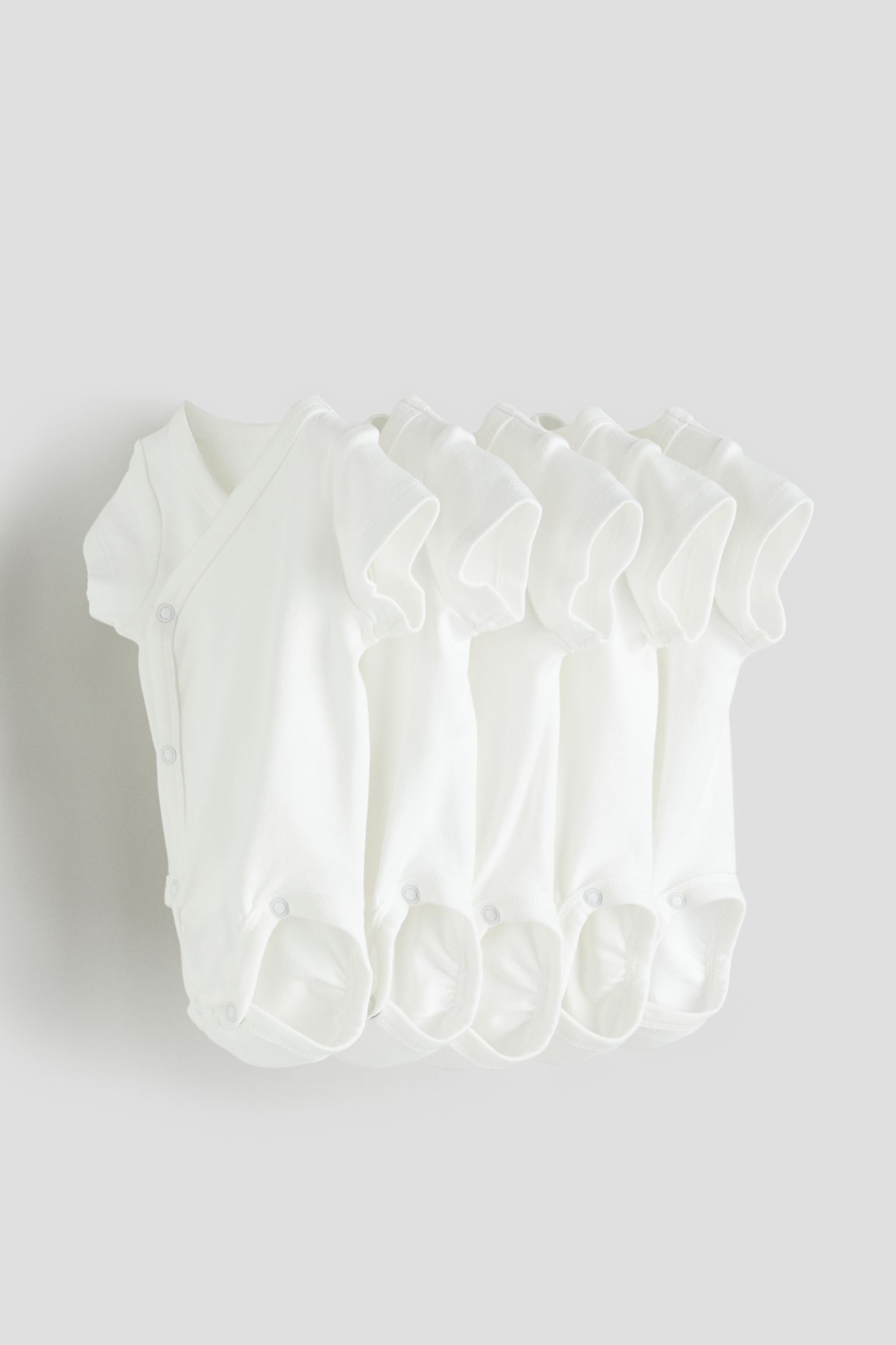 

Комплект из пяти боди с запахом