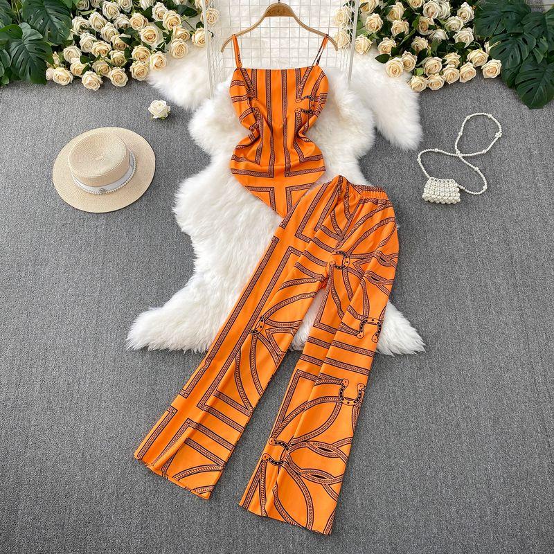 

2025 Новая Мода для Отпуска Принт Необычный Топ на Бретелях + Свободные Стройнящие Брюки Палаццо Комплект Высокого Качества Orange color One size