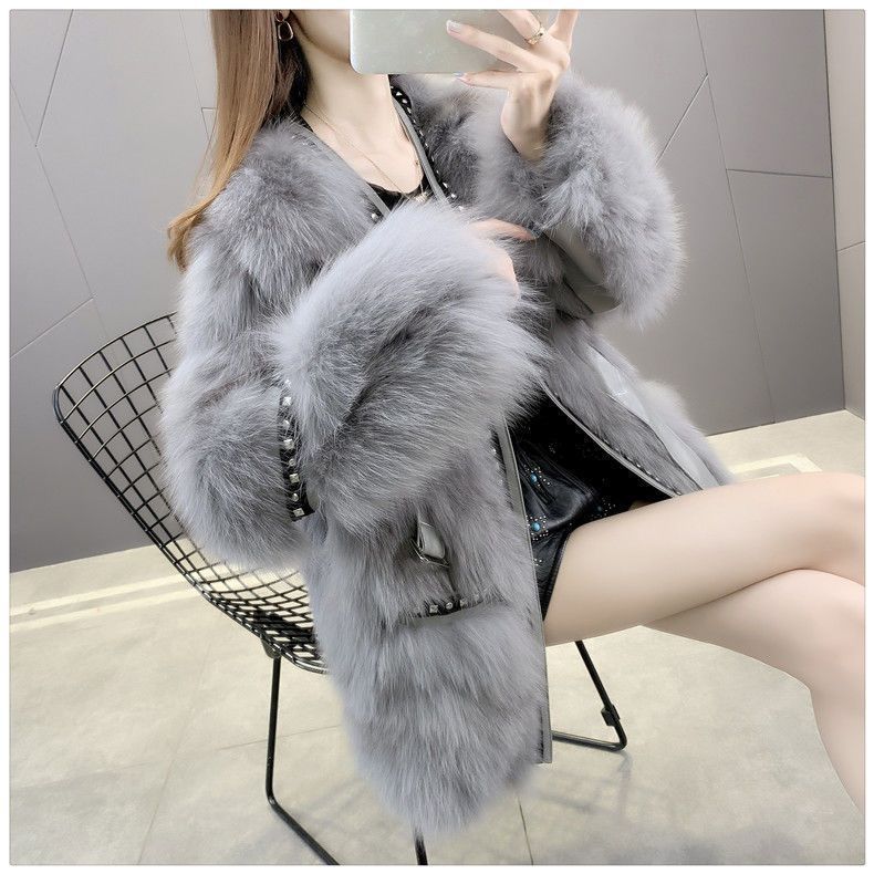 

Winter new light fur coat long hair coat women s rivets medium and long coat waist 3XL