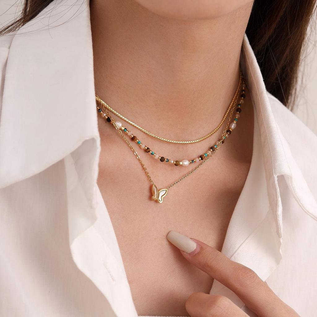 Elegant Pearl & Butterfly Pendant Necklace - Women's Titanium Steel, High-End European & American Fashion.