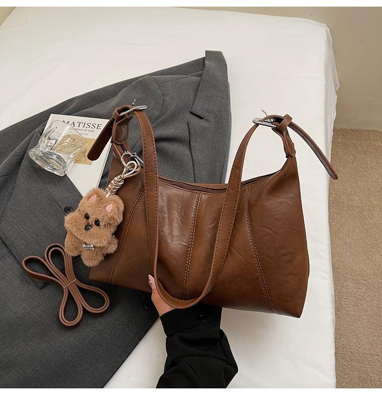 

Retro oil wax leather messenger bag, crescent bag, new trendy large-capacity versatile shoulder bag, textured underarm women s bag коричневый