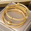 Trend European and American Personality Twist Opening Adjustable Twist Steel Wire Gold Ball Bracelet 2026