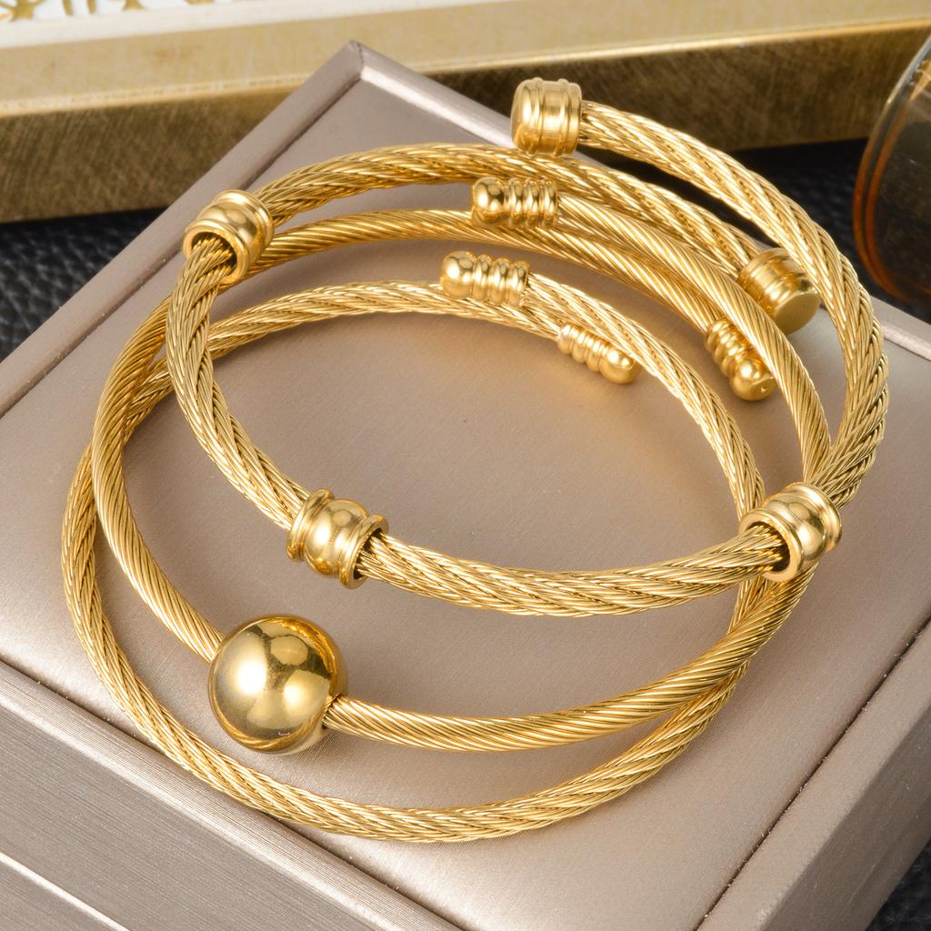 Trend European and American Personality Twist Opening Adjustable Twist Steel Wire Gold Ball Bracelet 2026