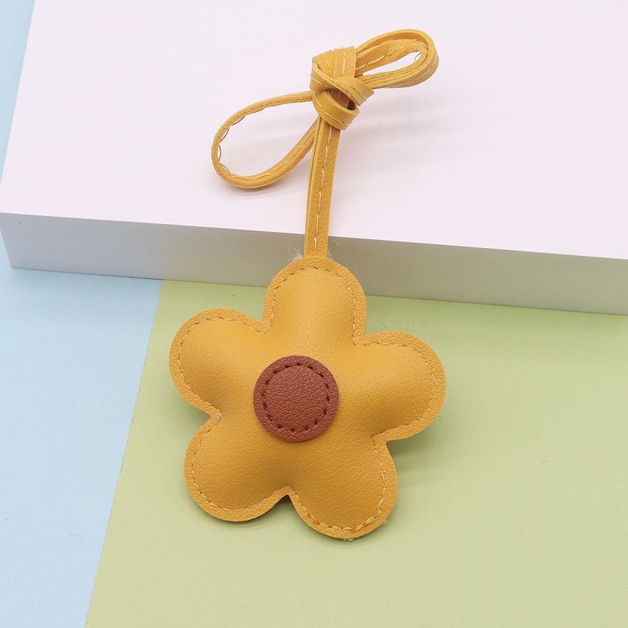 

Маленька шкіряна сумка-підвіска у формі квітки, прикраса-підвіска One Size жовтий