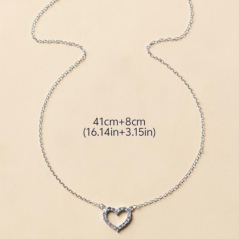 A Pendant Necklace for Women with a Rhinestone-embellished Hollow Heart Design for Valentine's Day