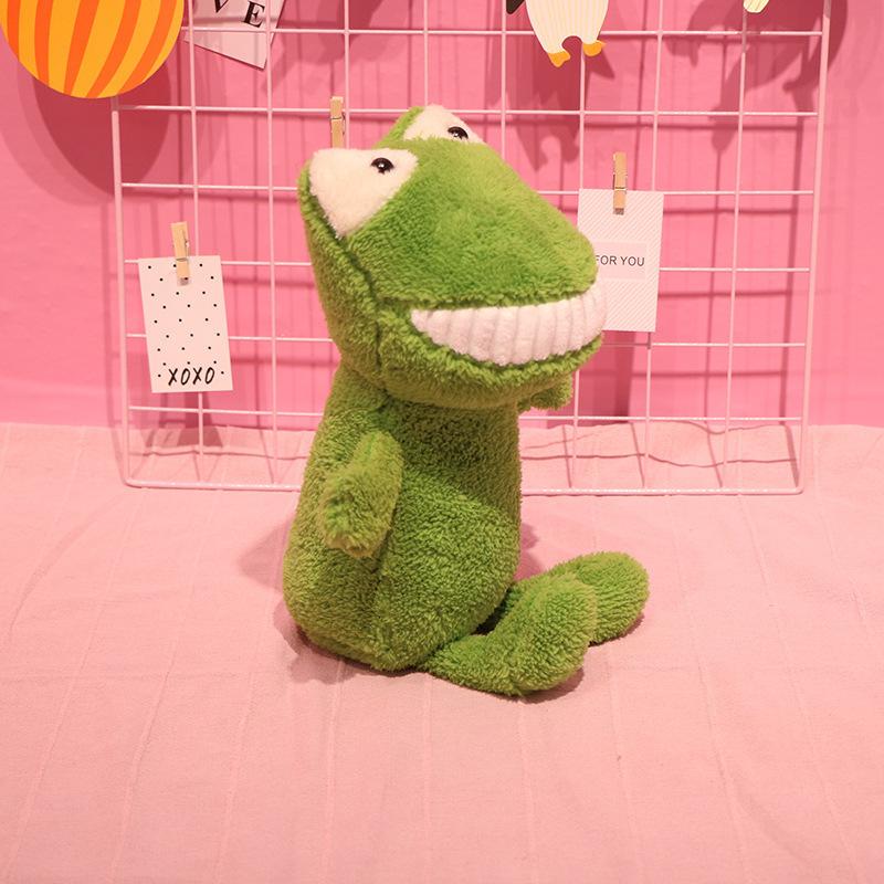 The same smiling big tooth doll, creative plush toy with hand gift, grab machine doll, throw cloth doll