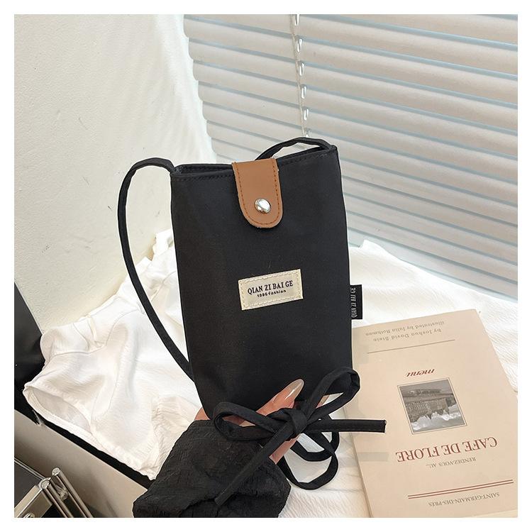 

2025 лето новая высококачественная текстурная сумка-ведро модная универсальная нейлоновая сумка для мобильного телефона нишевый дизайн сумка-мессенджер