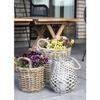 4 Round Rattan Baskets with Handles and Plastic-coated Interior