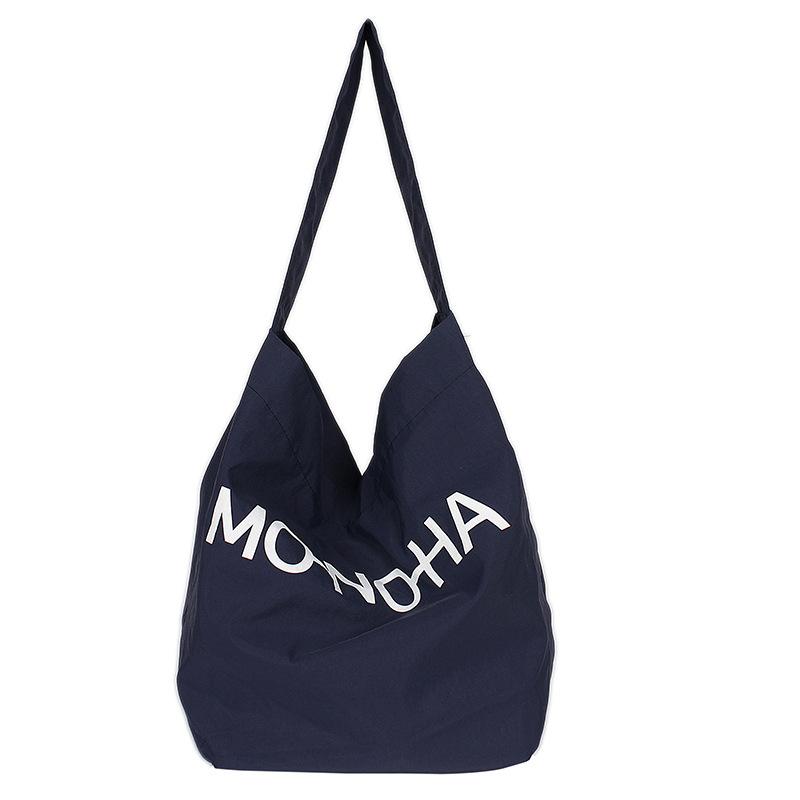

2025 new large-capacity student class commute canvas bucket bag women s fashion letter solid color simple shoulder bag