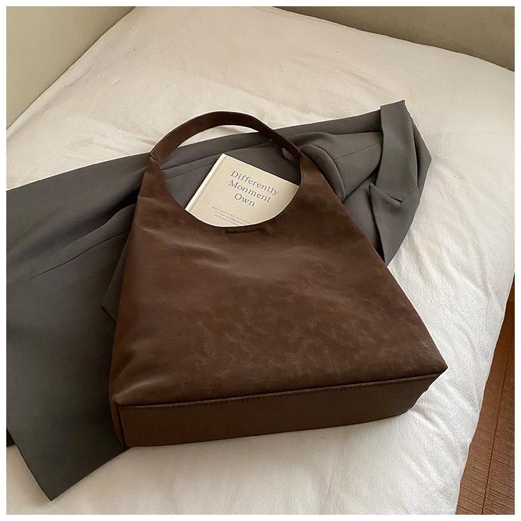 2025 Neue personalisierte Mode Lässige Schulter-Tragetasche Retro Große Kapazität Mode Pendler Schulterbrötchen Schwiegermuttertasche