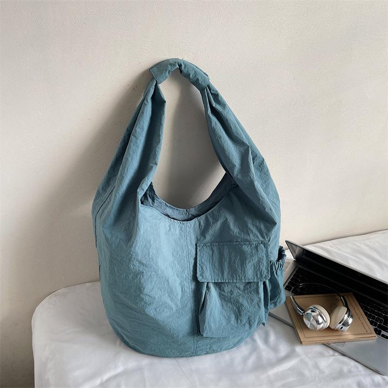 Japanese and Korean lazy feng washed canvas bag commuter large capacity crossbody bag literary style solid color men's and women's commuter cloth bag
