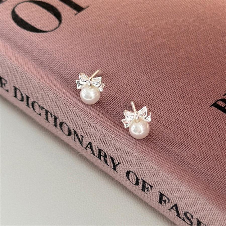 Bow pearl stud earrings 925 silver fashion niche design earrings light luxury temperament sweet earrings
