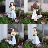 Wind Blowing The Hem Of A Woman's Skirt Resin Figurine