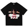 Young Man with Curly Hair and Number 77 T-shirt