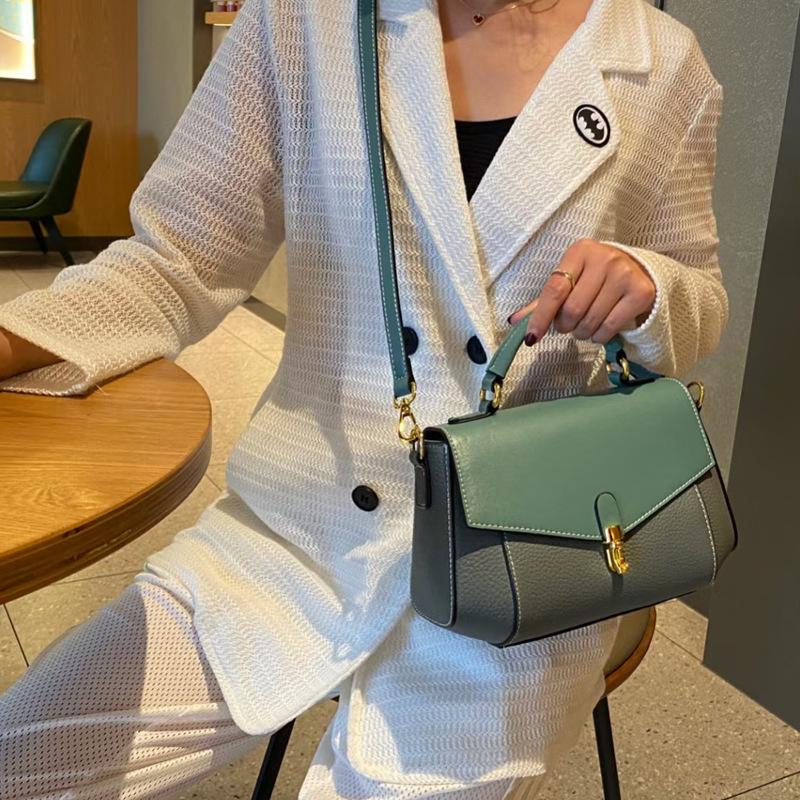 Fashion Commuting Versatile Hand held Crossbody Bag with Cowhide Temperament  Leather Shoulder Straps  Genuine Leather Women's Bag