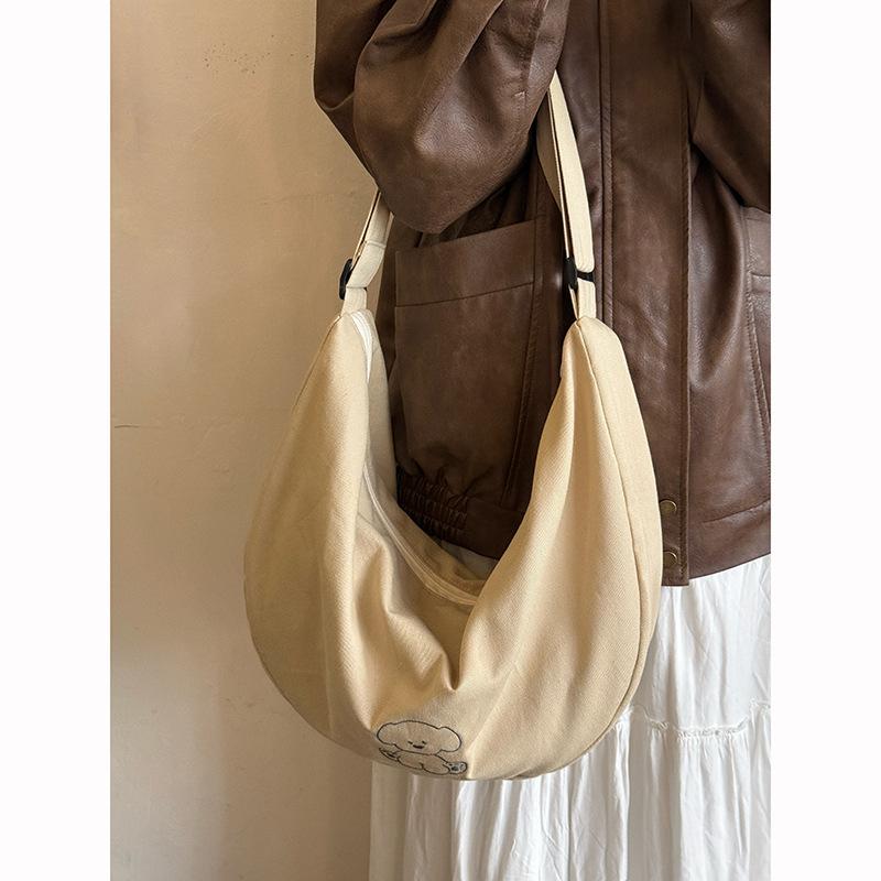 Korean large-capacity puppy embroidered messenger bag new casual versatile shoulder tote bag niche commuter canvas bag