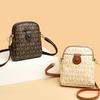 Sac à bandoulière asymétrique pour femme, nouveau, tendance et à la mode, sac coquillage quatre saisons pour téléphone portable