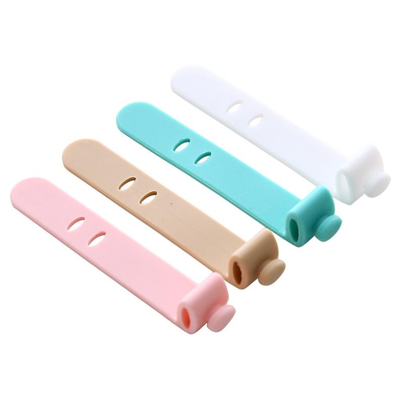 4 packs of silicone straps, anti-loss earphones, storage, soft tape, data cable, cable strap, cable manager, winding device.