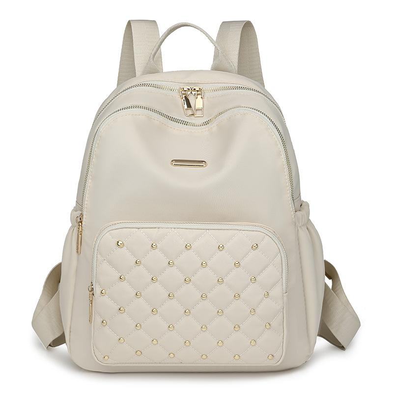 

Summer New Nylon Backpack Women s Casual Versatile Rivet Travel Backpack Large Capacity Multilayer Women s Shoulder Backpack