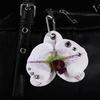 Personlig nyckelring med Phalaenopsis Kreativ handstansad punkteringssimulering Blomprydnad Ryggsäckstillbehör Gåvor