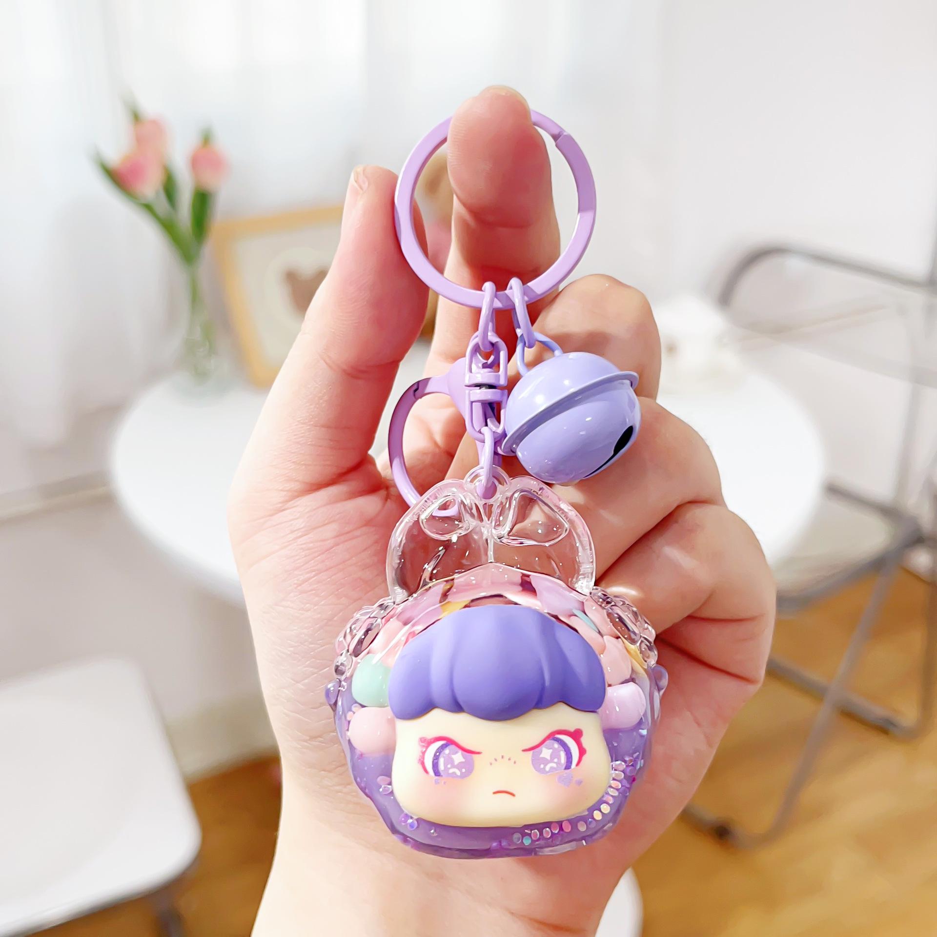 Creative Acrylic Oil-Filled Sand Keychain: Adorable Mengmeng Rabbit Pendant for Primary School Backpacks.