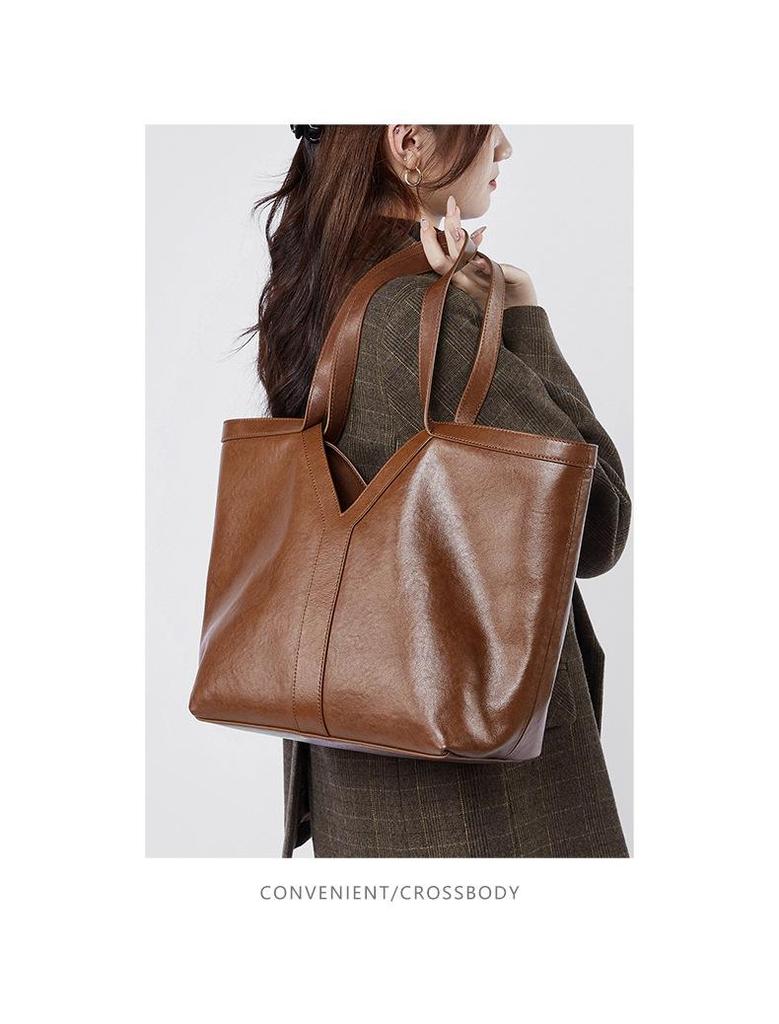 Sac fourre-tout et sac à bandoulière en cuir véritable pour femme de style coréen d'automne 2024, sac à main en cuir de vache de grande capacité.