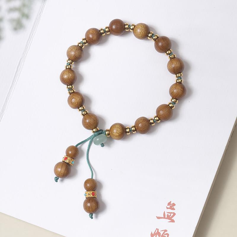Armband aus goldenem Sandelholzperlen mit Quaste: Unisex Multi-Wrap Rosenkranz im alten chinesischen Stil.