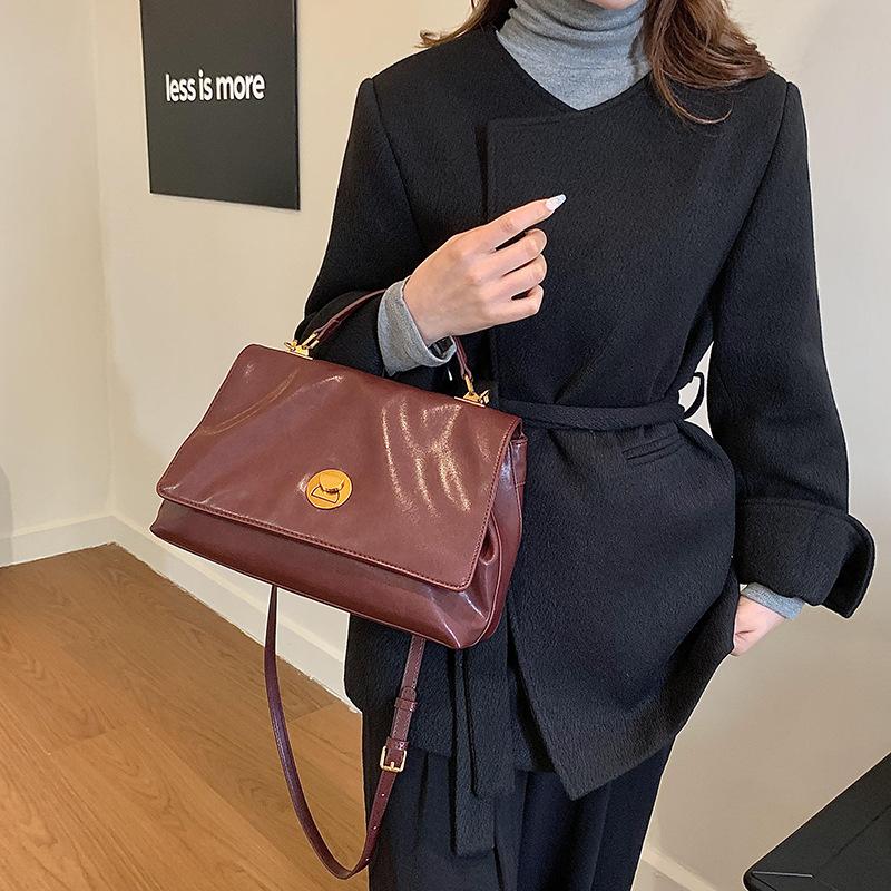 New fashion trend lock official document portable shoulder oblique span women's bag