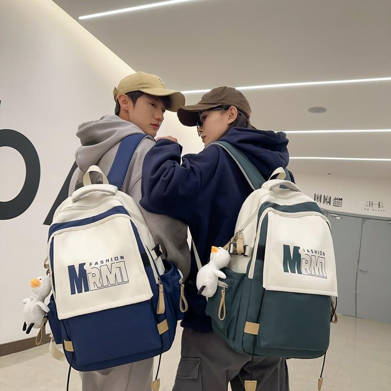College style large letter color matching student schoolbag spring new large-capacity junior high school backpack