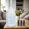 7 Color Hollow Out Aromatherapy Diffuser  Includes 3 Essential Oils, Auto Shut Off & Whisper Quiet Operation