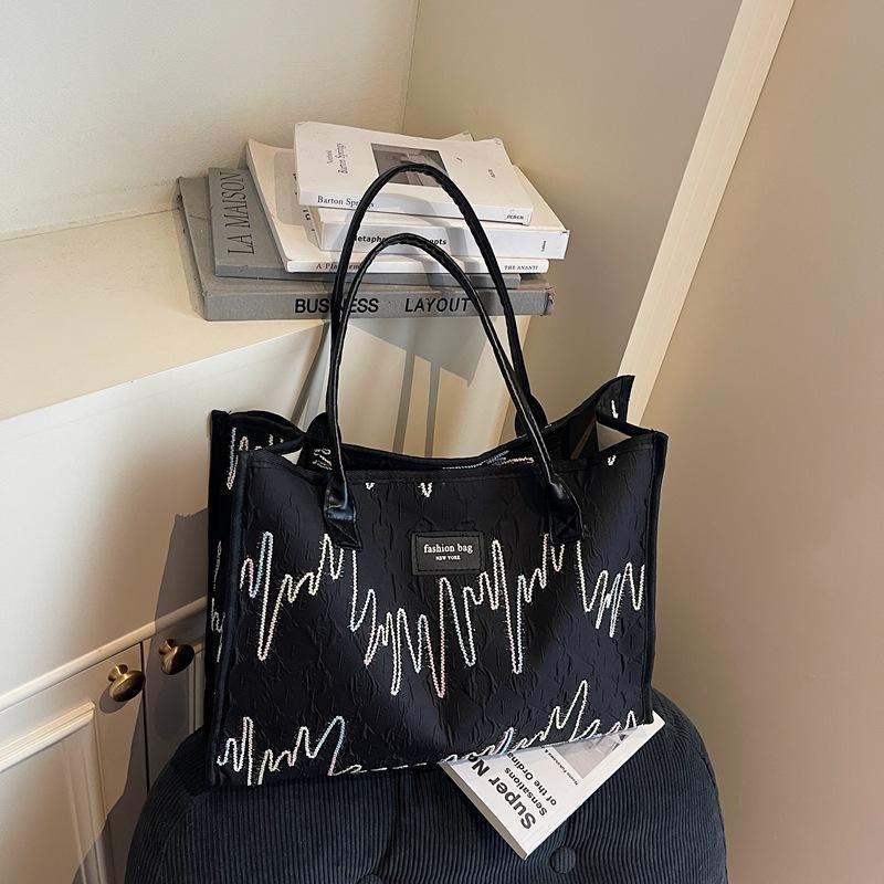 Bag women's large-capacity new women's bag shoulder commuter bag women's texture casual portable tote bag