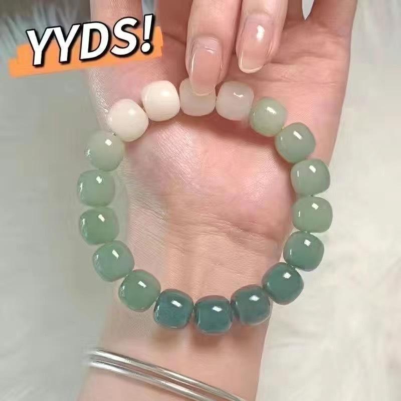 Xiaohongshu Style Soft Gradient Pink Bracelet for Students: Ice Transparent Finger Wrap Around Beads - Perfect for Gifting Besties.